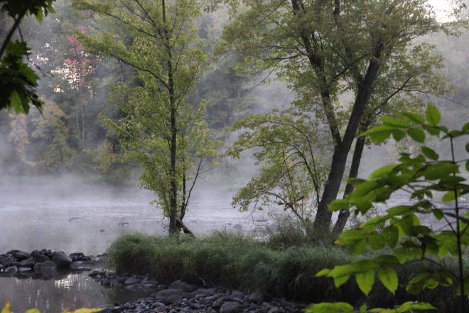 Early morning mist swirls over the Snake River in Pine County, Minnesota.